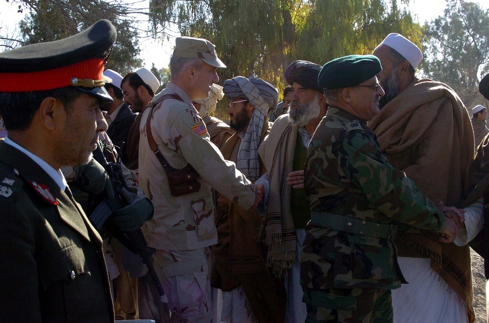 U.S. and Afghan Generals Greeted by Local Residents in Khowst