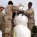 Soldiers Build Snowman Amid Snowy Conditions at Afghan Base