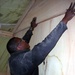 Soldier Constructs Wall in Living Quarters at Afghan Forward Operating Base