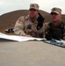 Army Officers Discuss Convoy Operation After Village Assessment