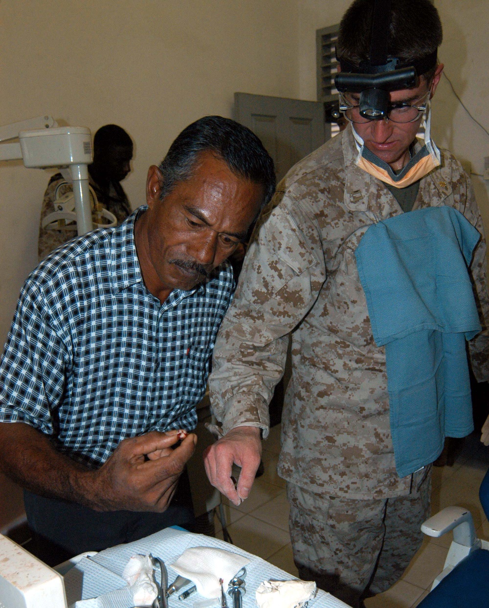 Navy Dentist Extracts Tooth for Indonesian Patient