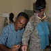 Navy Dentist Extracts Tooth for Indonesian Patient