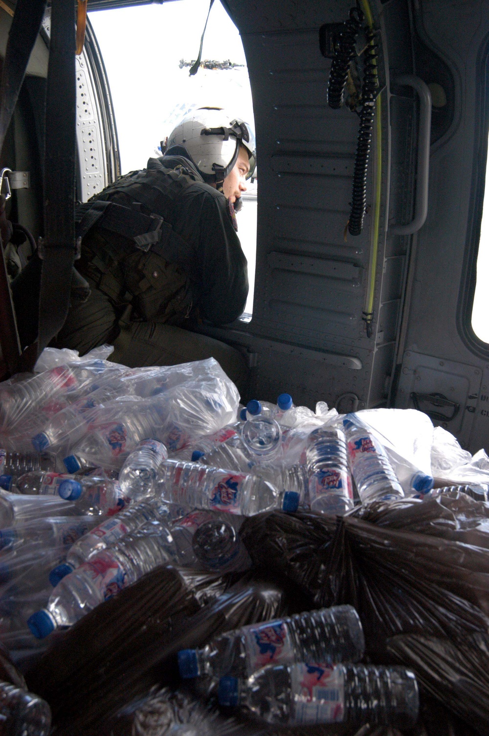 Navy Crew Delivers Water to Earthquake Victims in Indonesia