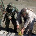 U.S. and Indonesian Forces Collaborate to Distribute Supplies After Tsunami
