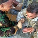 Marines, Indonesian Troops Arm-Wrestle to Aid Tsunami Victims