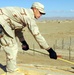 Army Carpenter Measures Guard Tower at Firebase Waza Khwa