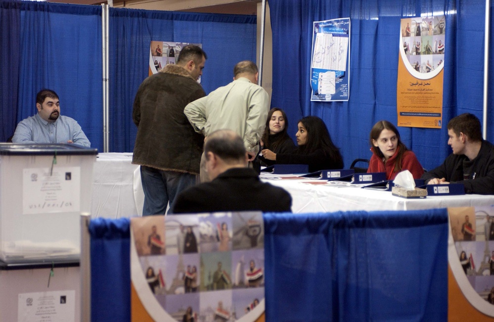Iraqi Citizen Casts Absentee Ballot in U.S. Ahead of Iraq Election