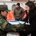 U.S. and Allied Troops Deliver Aid to Needy Family in Kosovo
