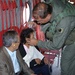 U.S. Soldier Assists Elderly Couple Evacuated from Guatemala Village After Hurricane Stan