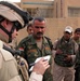 U.S. Army Captain Assists Iraqi Security Forces at Polling Station