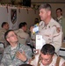 Rumsfeld Delivers Phone Cards to Troops in Iraq