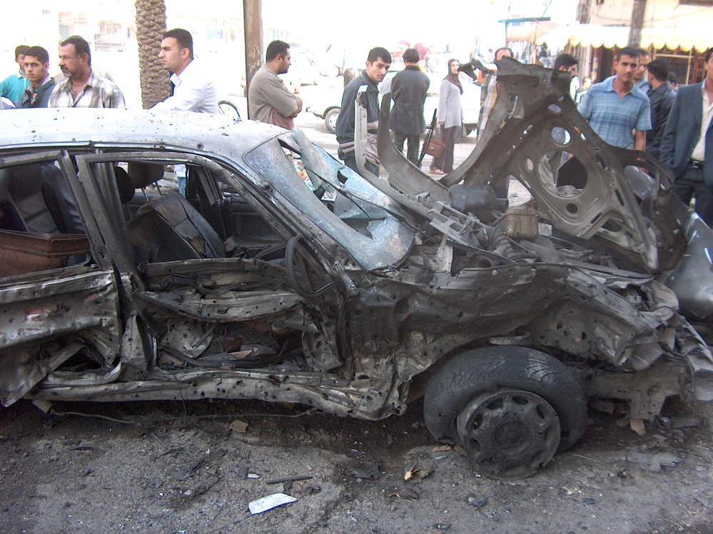 Aftermath of Suicide Car Bombing Rocks Baghdad Neighborhood
