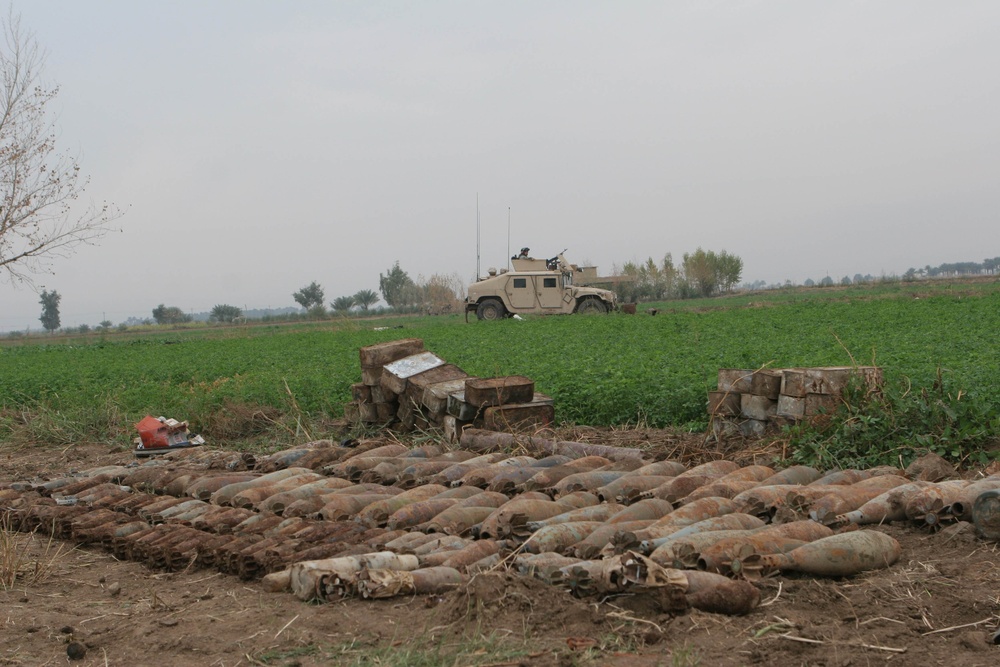 Humvee Guards Weapons Cache Uncovered West of Baghdad