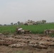 Humvee Guards Weapons Cache Uncovered West of Baghdad