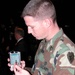 Army Medic Demonstrates Portable Medical Data Collector Used in Iraq