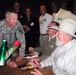 Army Gen. B.B. Bell Joins Troops for Autograph Session with Charlie Daniels