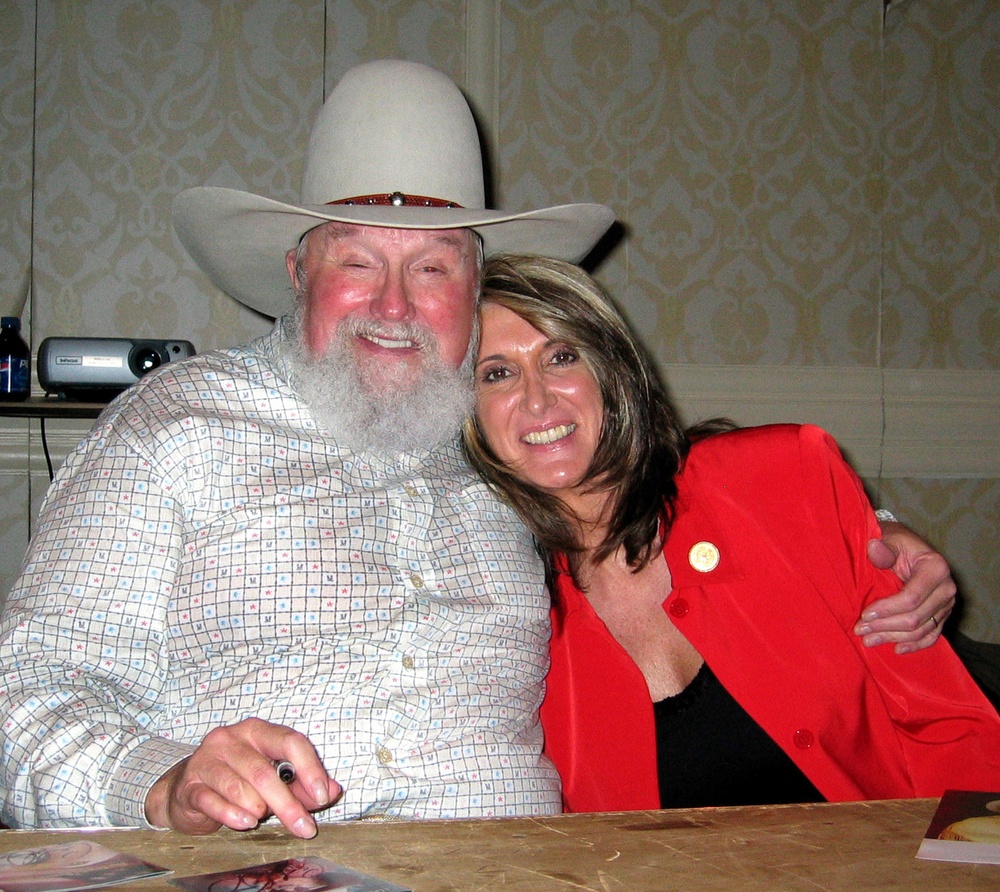 Country Music Icon Charlie Daniels Embraced by Stars for Stripes CEO Judy Seale at AUSA Event
