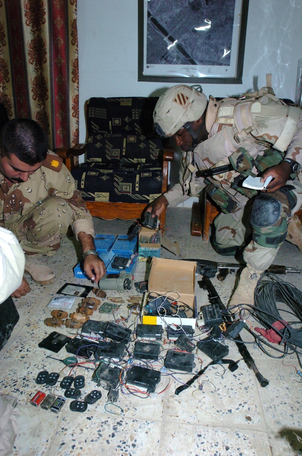 Iraqi, U.S. Troops Uncover Bomb-Triggering Devices in Sadr City Raid