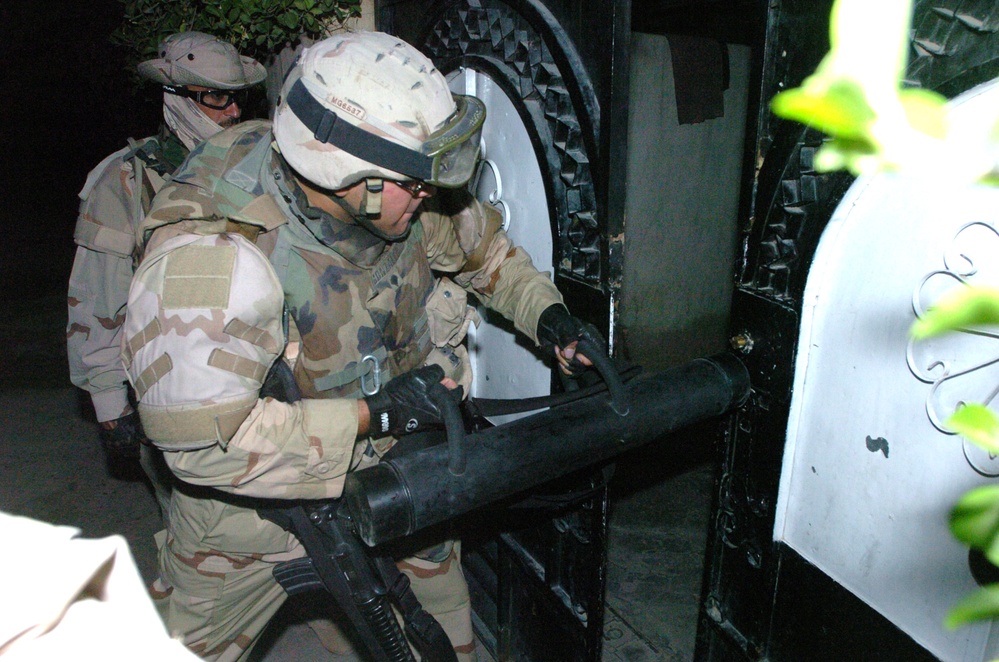 Army Spc. Breaks Down Gate in Baghdad Raid