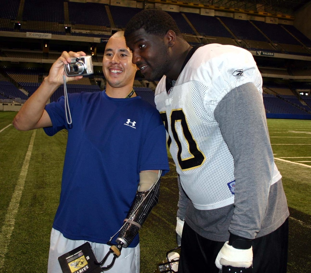 Army Sgt. Meets Saints Tackle for Book Signing
