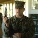 Marine Sgt. Explains Pistol to Civilian Professionals at Quantico