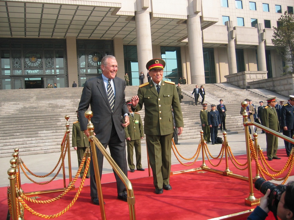 Rumsfeld and Chinese Defense Minister Observe Military Parade in Beijing