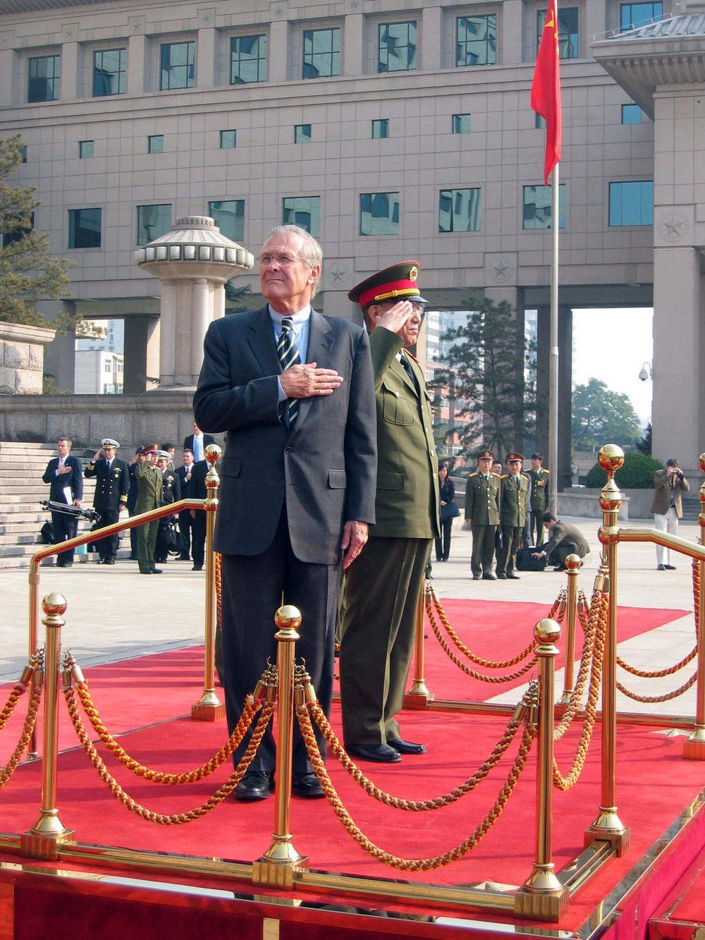 Rumsfeld, Chinese Defense Minister Honor U.S. National Anthem in Beijing