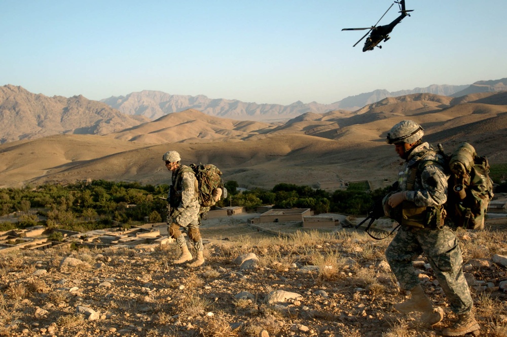 Airborne Troops Advance Under Apache Overwatch in Afghanistan