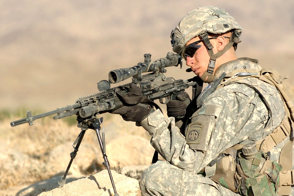 Soldier Provides Overwatch During Village Search in Afghanistan
