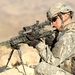 Soldier Provides Overwatch During Village Search in Afghanistan