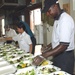 Contracted Food Service Workers Prepare Meals for Detainees at Guantanamo Bay