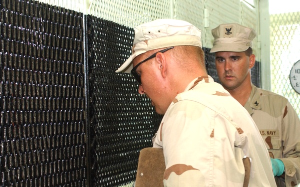 Guantanamo Bay Detainee Receives Food Through Cell Slot