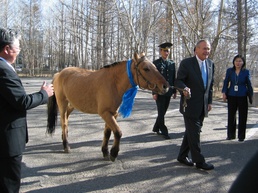 Rumsfeld Rides Horse Named Montana in Mongolia