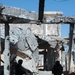 Army Soldiers Examine Crater in Bombed-Out Building at Tarnak Farms