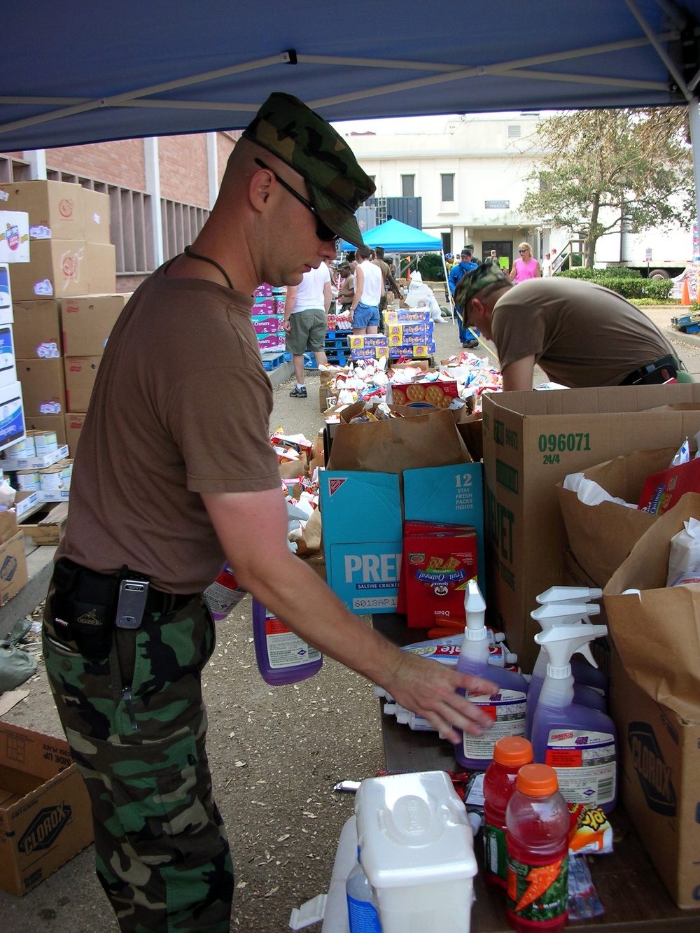 Army Sergeant Distributes Supplies to Disaster Victims