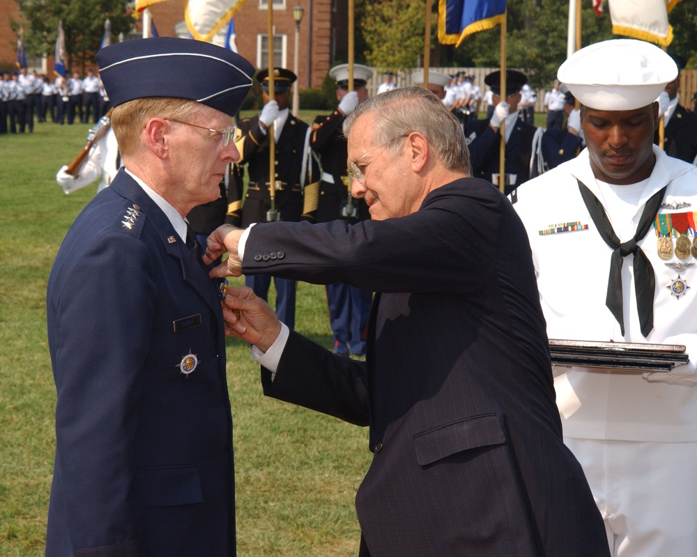 Rumsfeld Honors Outgoing Air Force General Handy at Change of Command Ceremony