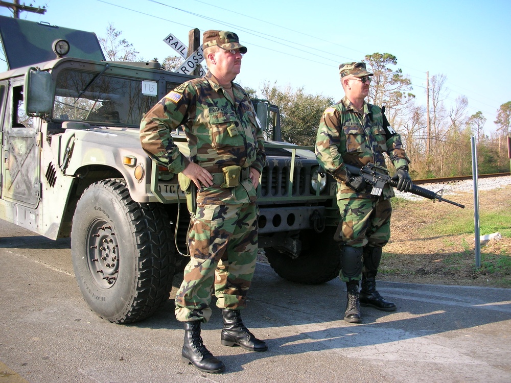 National Guard Troops Secure Entry Point in Long Beach, Miss.