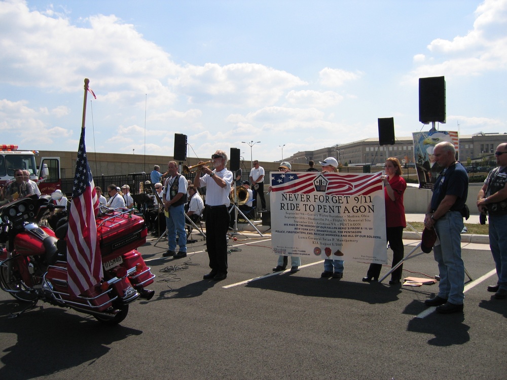 Bugler Plays &quot;Taps&quot; at 9/11 Closing Ceremony in Pentagon Parking Lot