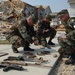 National Guard Secures Weapons from Hurricane Katrina Rubble