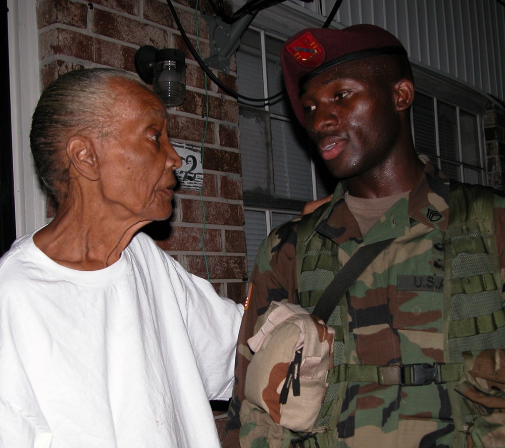 Army Paratrooper Helps New Orleans Resident After Hurricane