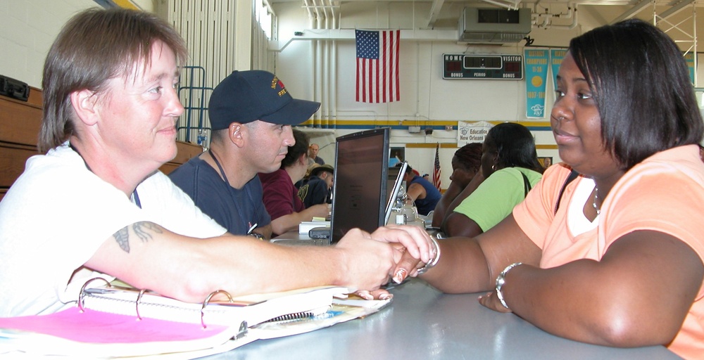 FEMA Employee Assists Hurricane Katrina Victim in New Orleans