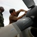 U.S. Airman Trains Nigerien Counterpart on C-130 Turboprop Maintenance