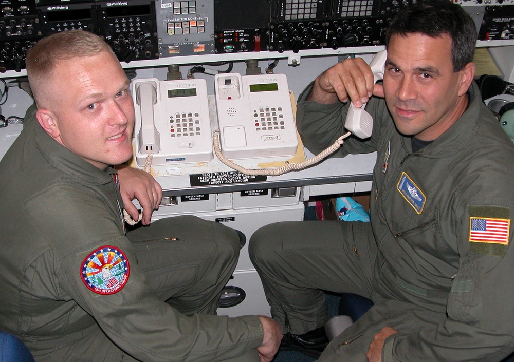 Air Force Airmen Maintain Communications Aboard Rumsfeld's Aircraft
