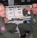 Air Force Airmen Maintain Communications Aboard Rumsfeld's Aircraft