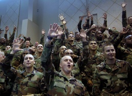 Troops Cheer as USO Celebrities Visit Camp Casey