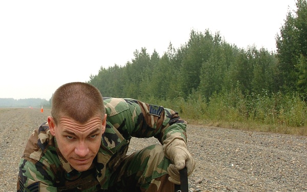 Air Force Tech. Sgt. Installs Portable Runway Lighting for Alaska Defense Exercise