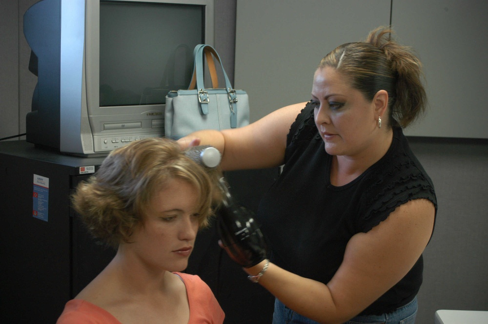 Stylist Preps Soldier for Photo Shoot at Fort Sam Houston