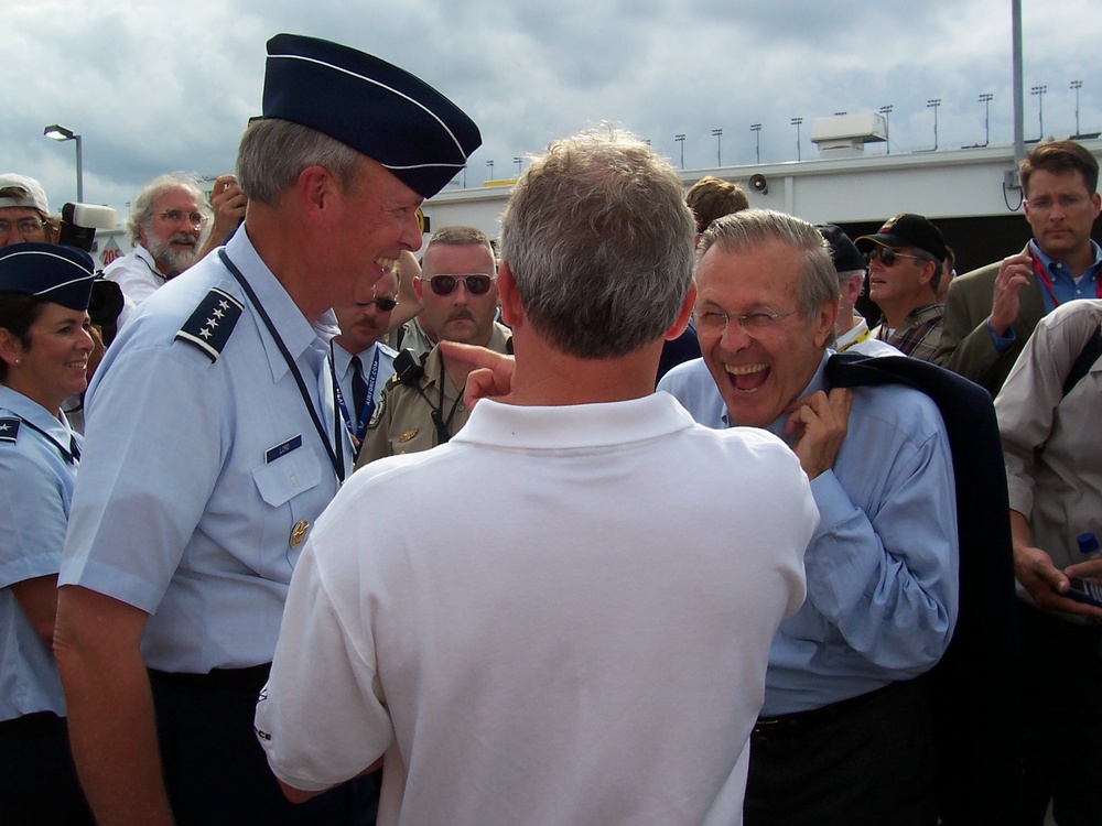 Rumsfeld Shares Laugh with Air Force Commander at Pepsi 400
