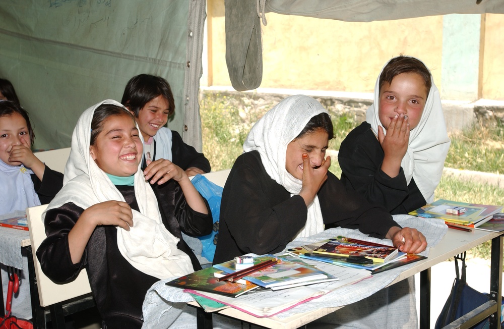 Afghan Girls Receive School Supplies from U.S. and British Forces