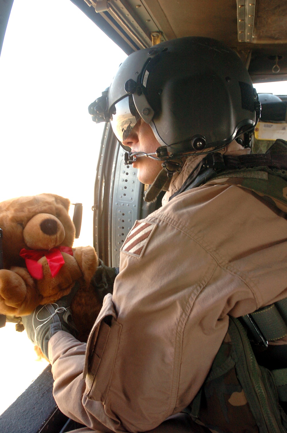 Soldier Delivers Teddy Bears to Iraqi Children in Humanitarian Mission